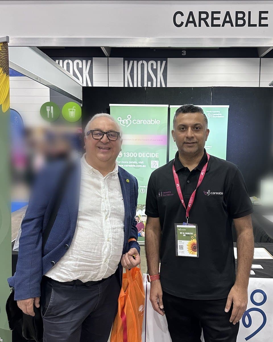 Vivek and Con at the Careable stand